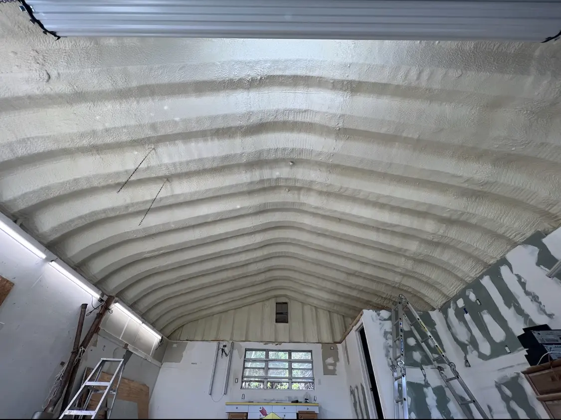 Spray polyurethane foam applied to the underside of a metal roof deck in Tinton Falls